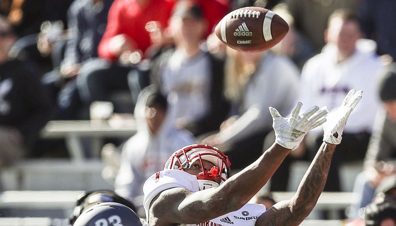 Arkansas State wide receiver Omar Bayless makes a catch against Nevada in last season’s Arizona Bowl.