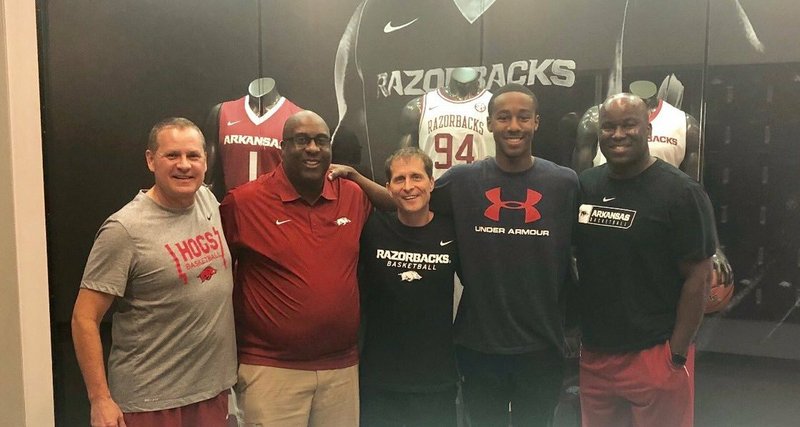 5-star Bryce Thompson poses with the Arkansas staff. 