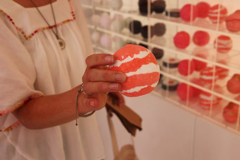 Among the most popular of Lush Cosmetics’ iconic bath bombs: The Olive Branch, bearing lemon and Sicilian mandarin oils, orange flower and bergamot. The Olive Branch was sold along with the company’s other bath bombs at its recent pop-up shop in Little Rock. 