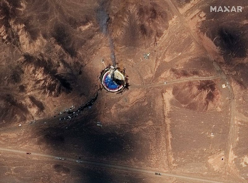 The remains of a rocket smolder on the launchpad Thursday at Imam Khomeini Space Center in Iran’s Semnan province after an apparent failed launch of a communications satellite. Iran did not immediately acknowledge the explosion. The U.S. contends that such launches defy a U.N. Security Council resolution against activity by Iran related to ballistic missiles capable of delivering nuclear weapons.