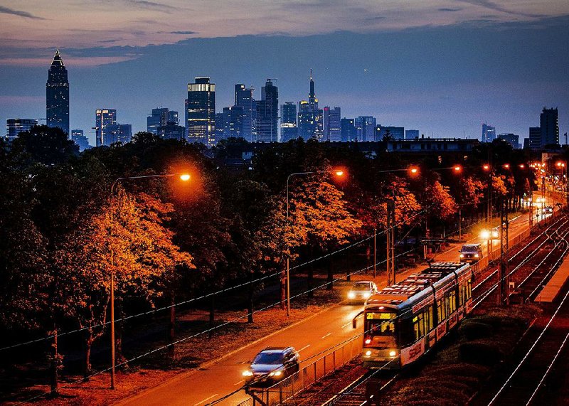 Rail and auto traffic moves through Frankfurt, Germany, last week. Germany’s economy, the EU’s largest, contracted in the second quarter. 