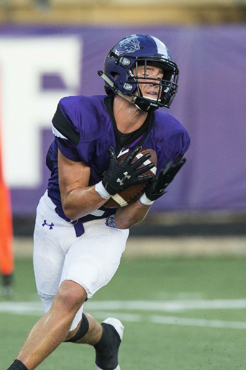 Wide receiver Connor Flannigan and the Fayetteville Purple Bulldogs take on Bryant tonight in Fayetteville.