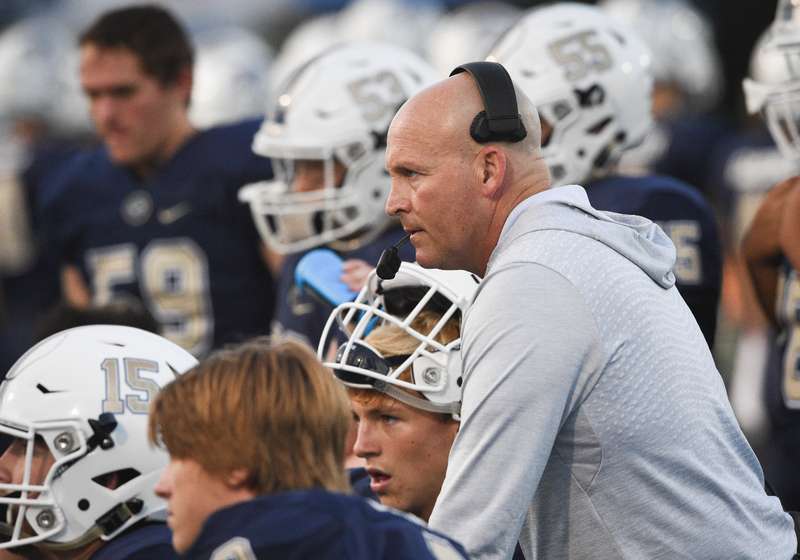 Bentonville West High School head coach Bryan Pratt watches footage with his players during a football game, Friday, August 30, 2019 at Bentonville West High School in Centerton.