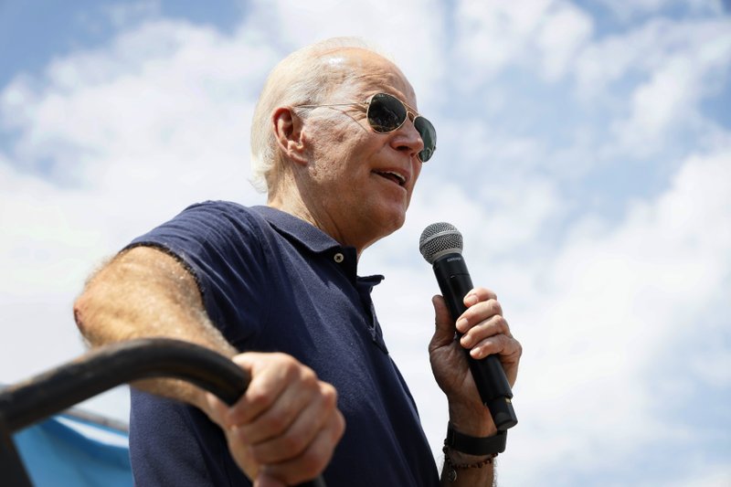 FILE - In this Aug. 8, 2019, file photo, Democratic presidential candidate former Vice President Joe Biden speaks at the Des Moines Register Soapbox during a visit to the Iowa State Fair in Des Moines, Iowa. (AP Photo/Charlie Neibergall, File)