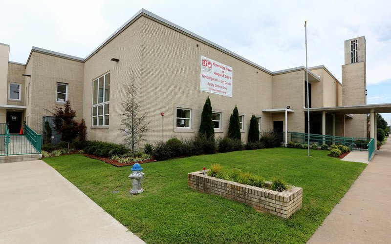 NWA Democrat-Gazette/DAVID GOTTSCHALK Lisa Academy Springdale is visible Friday, August 16, 2019, at 301 Holcomb Street in Springdale. The academy is now in the location of the former Ozark Montessori Academy.