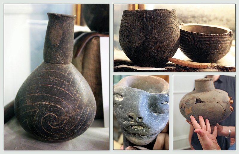 Objects from the A.C. Looney and R.H. Kolb Collection include (clockwise, from left) a Taylor Engraved Caddo bottle dated from 1500 to 1700 A.D. at the Drew County Historical Museum; two pots at Drew County; a repaired Bell Plain bottle at Drew County, and a reproduction of a pipe with effigy figures at the Desha County Museum. 