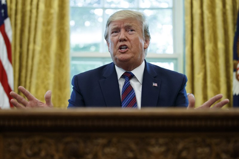 President Donald Trump speaks in the Oval Office of the White House in Washington, Friday, July 26, 2019. (AP Photo/Carolyn Kaster)