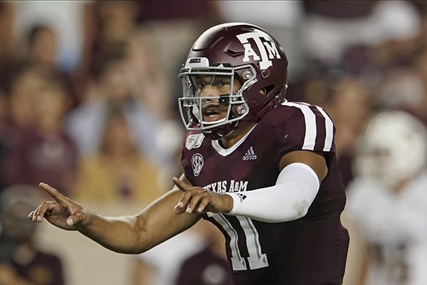 Texas A&M's Kellen Mond (11) directs his team against Texas State during the second half of an NCAA college football game in College Station, Texas, Thursday, Aug. 29, 2019. (AP Photo/Chuck Burton