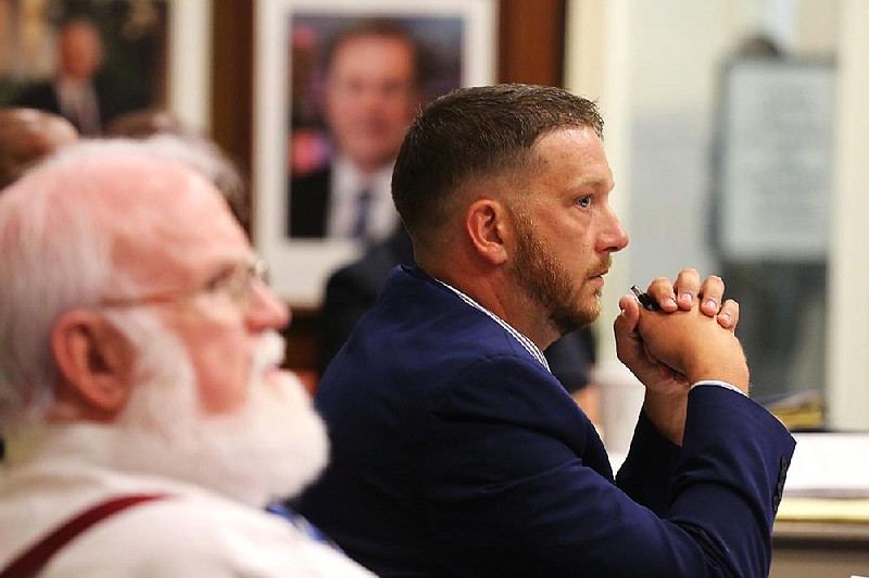 Arkansas Democrat-Gazette/THOMAS METTHE -- 9/4/2019 --
Former Little Rock Police officer Charles Starks listens to testimony during the Civil Service Commission hearing on Wednesday, Sept. 4, 2019, at Little Rock City Hall. 