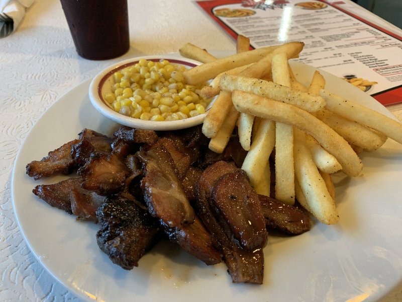 Mama D's Special Recipe Pork Platter is one of the Asian surprises at Mama D's in North Little Rock. Arkansas Democrat-Gazette/Eric E. Harrison
