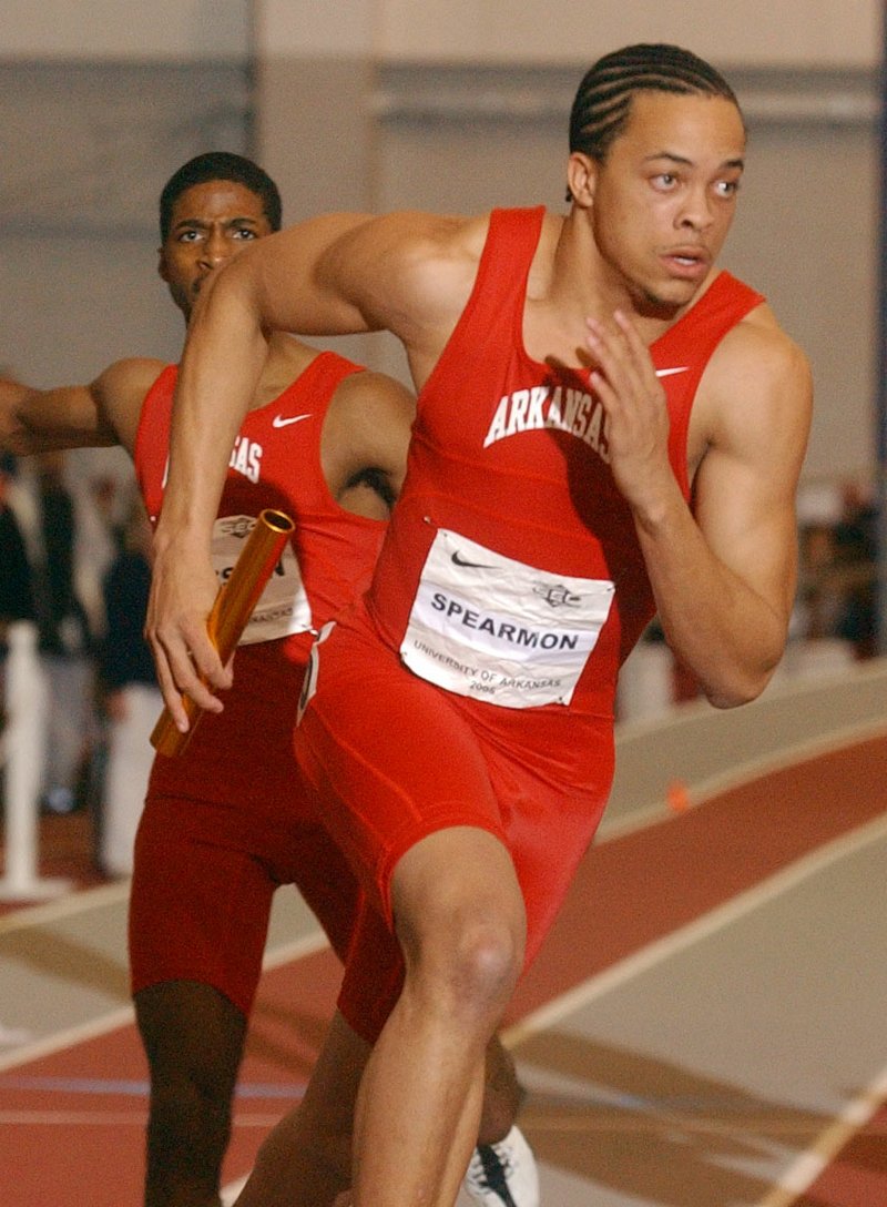 FILE PHOTO Arkansas Razorback Wallace Spearmon Jr. competes in the final leg of 4x400 relays during the 2005 Southeastern Conference Track and Field Championship at Randal Tyson Track Center in Fayetteville. Spearmon Jr. will be one of 14 Arkansas athletics standouts inducted into the UA Sports Hall of Fame on Sept. 13.