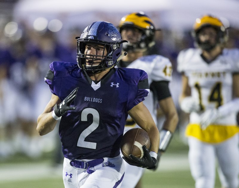 Connor Flannigan, Fayetteville wide receiver, runs for a touchdown in the second quarter vs St. Louis Vianney Friday, Aug. 30, 2019, at Fayetteville's Harmon Stadium.