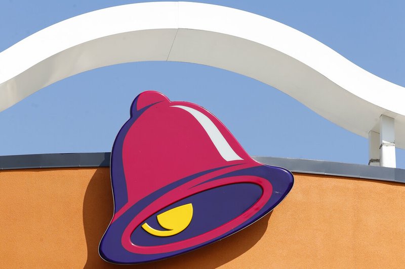 In this photo taken Tuesday, July 30, 2019, a sign outside a Taco Bell restaurant in Conyers, Ga.is shown. (AP Photo/John Bazemore)