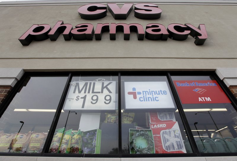 This May 4, 2009 photo, shows a CVS pharmacy in Worth, Ill. Drug chains CVS and Walgreens, as well as grocery chain Wegmans Food Market, have joined the chorus of retailers requesting that customers refrain from openly carrying firearms in their stores even where state laws allow it. (AP Photo/M. Spencer Green, File)