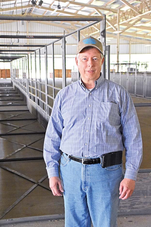 David Henze stands in the livestock barn at the Conway Expo Center and Fairgrounds. Henze grew up a couple of blocks from the former Faulkner County Fairgrounds on South German Lane. He helped write bylaws in 2007 for a new fair board and became its chairman in 2008. The 81st Faulkner County Fair is scheduled for Sept. 17-21.