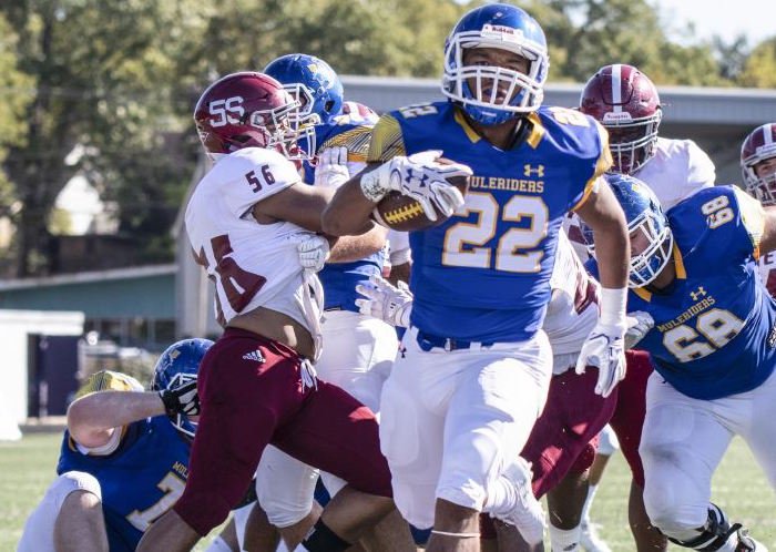 A 2018 SAU photo shows SirCharles Perkins (22) blasting through a pile of players on his way to a touchdown. The senior on Thursday rushed for 103 yards and scored two TDs on the Muleriders win over Southern Nazarene in their opening game of the 2019 season. 