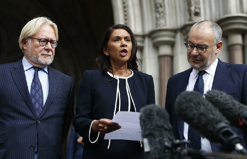 Anti-Brexit campaigner Gina Miller speaks to the media Friday outside the High Court in London. Miller lost a bid to keep British Prime Minister Boris Johnson from suspending Parliament, but the High Court judges said the case could be appealed to the Supreme Court 