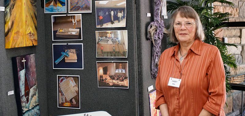 Submitted photo Casey Neal at the Creative Visual Arts Ministry table, 2018 Ministry Fair. Photo courtesy of VBC.