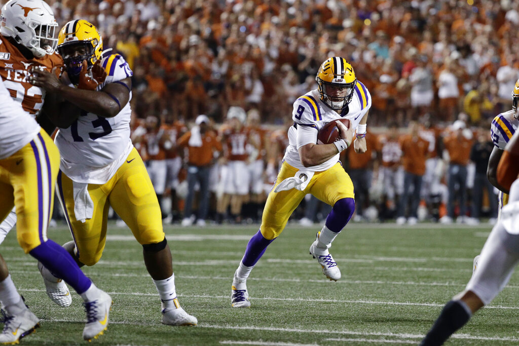 Clemson's Lawrence throws 64-yard TD on his 1st play from scrimmage