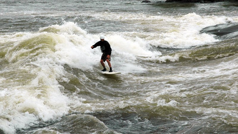 The adventurous can surf in Columbus without the benefit of ocean waves. Wave Shaper Island creates the waves and are a part of the 2.5 mile whitewater course on the Chattahoochee River. (Visit Columbus/TNS)