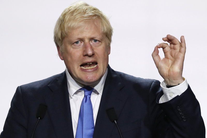 FILE - In this Monday, Aug. 26, 2019 file photo, Britain's Prime Minister Boris Johnson gestures during his final press conference at the G7 summit in Biarritz, southwestern France. (AP Photo/Francois Mori, File) story.lead_photo.caption