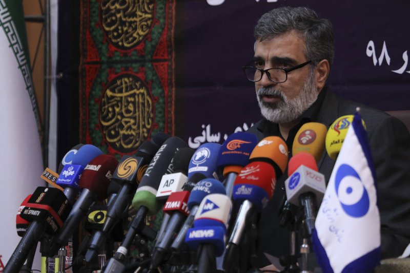 In this photo released by the Atomic Energy Organization of Iran, spokesman of the organization Behrouz Kamalvandi speaks in a news briefing in Tehran, Iran, Saturday, Sept. 7, 2019. Iran has begun injecting uranium gas into advanced centrifuges in violation of its 2015 nuclear deal with world powers, Kamalvandi said. (Atomic Energy Organization of Iran via AP)
