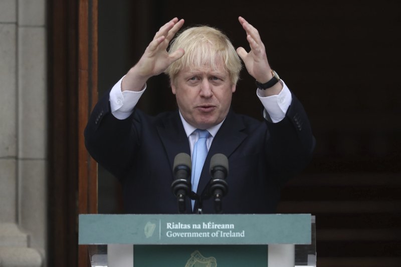 Britain's Prime Minister Boris Johnson gestures during a meeting with Ireland's Prime Minister Leo Varadkar at Government Buildings in Dublin, Monday Sept. 9, 2019. Boris Johnson is to meet with Leo Varadkar in search of a compromise on the simmering Brexit crisis. (Niall Carson/PA via AP)

