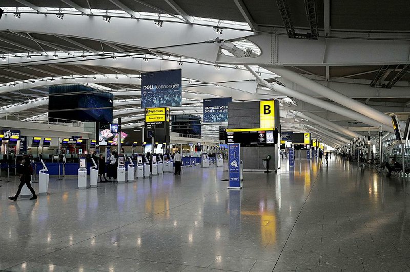 Terminal 5 at Heathrow Airport in London, which handles British Airways flights, stands nearly empty Monday during the pilots’ strike.