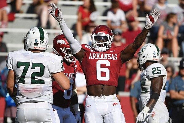 Arkansas defender Gabe Richardson celebrates after making a play against Portland State during an NCAA college football game, Saturday, Aug. 31, 2019 in Fayetteville, Ark. (AP Photo/Michael Woods)