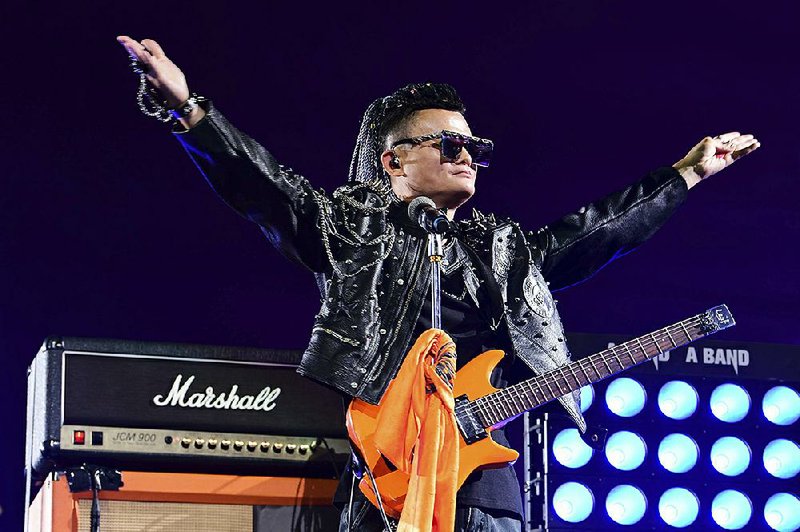 Jack Ma, founder of the Alibaba Group, performs at the company’s 20th anniversary celebration Tuesday in Hangzhou, China. story.lead_photo.caption