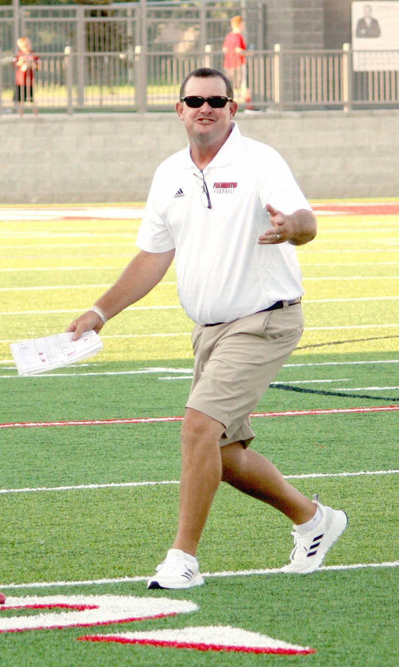 MARK HUMPHREY ENTERPRISE-LEADER Jay Harper returns as Farmington defensive coordinator after a few years hiatus. His defense played a second half of shutout football in the Cardinals' 27-7 victory over rival Prairie Grove Friday to open Cardinal Stadium with a win.