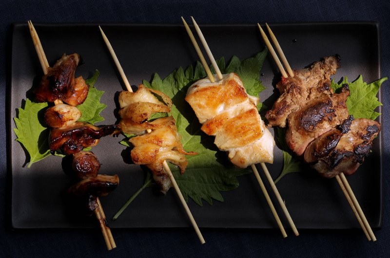 Yakitori (or chicken on a skewer) versions, left to right, tare style, torikawa, with shio (or salt) and reba (or livers). (Christian Gooden/St. Louis Post-Dispatch/TNS) 