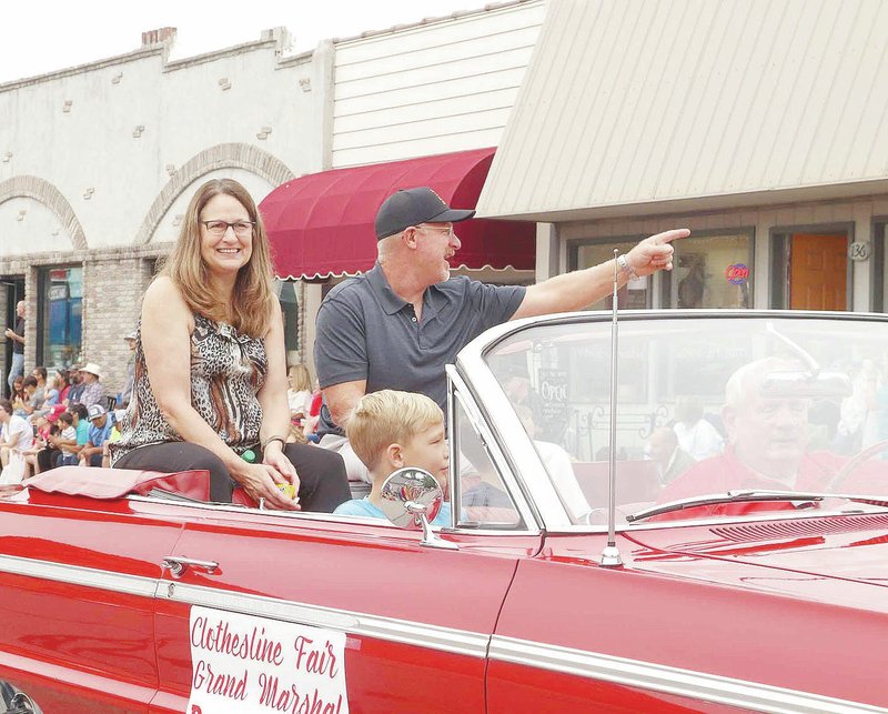 Prairie Grove football coach Danny Abshier was named Grand Marshal for the 2019 Clothesline Fair parade. His wife, Kaye, rides along with him in the parade.