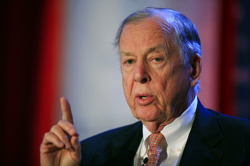 FILE - In this June 15, 2009, file photo, T. Boone Pickens, president of BP Capital Group, speaks at Time Warner's headquarters in New York. Pickens, a brash and quotable oil tycoon who grew even wealthier through corporate takeover attempts, died Wednesday, Sept. 11, 2019. He was 91. (AP Photo/Mark Lennihan, File) story.lead_photo.caption