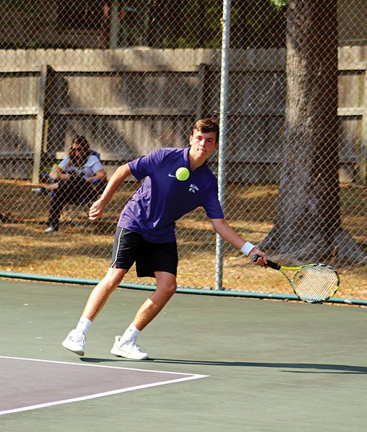 Sarah Primm/Special to the News-Times  El Dorado's Hunter Lawrence gets ready to make a return during tennis action Tuesday. El Dorado's boys and girls squads took on Hot Springs and Camden Fairview with the Lady Wildcats winning all seven matches, while the Wildcats went 5-1 on the day.