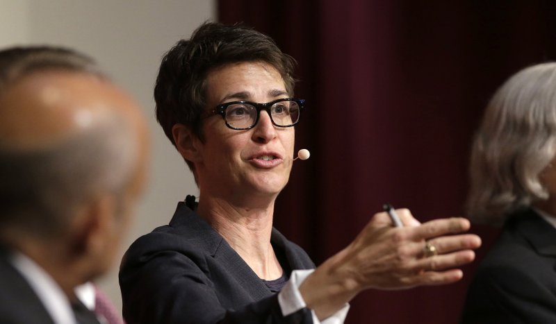  In this Oct. 16, 2017, file photo, MSNBC television anchor Rachel Maddow, host of the Rachel Maddow Show, moderates a panel at a forum called "Perspectives on National Security" at the John F. Kennedy School of Government on the campus of Harvard University in Cambridge, Mass. 