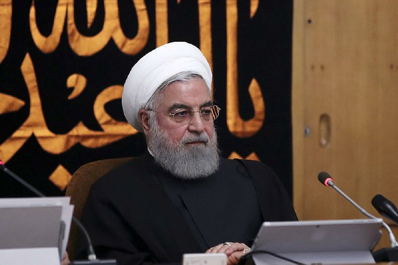 Iranian President Hassan Rouhani leads a Cabinet meeting Wednesday in Tehran, where he said in the wake of John Bolton’s dismissal as national security adviser that “Americans have to realize that warmongering and warmongers are not to their benefit.” 