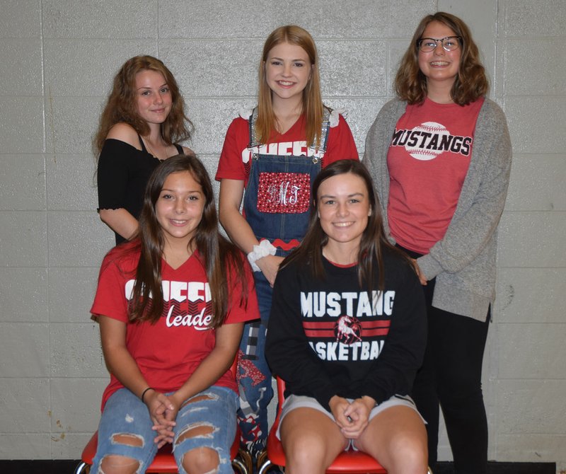 RICK PECK/SPECIAL TO MCDONALD COUNTY PRESS McDonald County High School will hold its 2019 football homecoming on Sept. 13 when the Mustangs host the east Newton Patriots. Front row, left to right: Freshman queen attendant Kalista Morris and junior queen attendant Lily Allman. Back row: Senior queen candidates Maya Dally, Demi Meador and Madeleine Bell. Not present: Gissele Reyes.