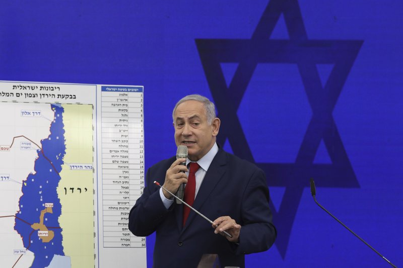 Israeli Prime Minister Benjamin Netanyahu speaks during a press conference in Tel Aviv, Israel, Tuesday, Sept. 10, 2019. Netanyahu vowed Tuesday to begin annexing West Bank settlements if he wins national elections next week. (AP Photo/Oded Balilty)