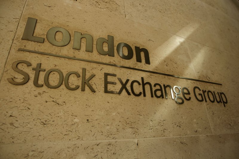 This Thursday, Sept. 22, 2011 file photo shows a sign outside the Stock Exchange in the City of London. The Hong Kong stock exchange said Wednesday Sept. 11, 2019, it has started talks to buy the London Stock Exchange that would value the British company at 29.6 billion pounds ($36.6 billion). (AP Photo/Matt Dunham, File)
