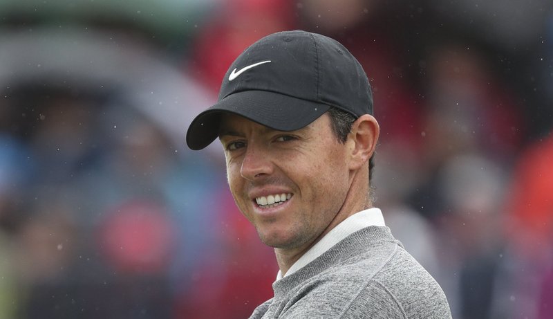 This is a July 19, 2019, file photo showing Northern Ireland's Rory McIlroy smiling on the first green during the second round of the British Open Golf Championships at Royal Portrush in Northern Ireland. 