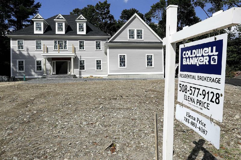 A new home sits for sale this month in Westwood, Mass. After a long slump this summer, long-term mortgage rates rose this week, according to mortgage buyer Freddie Mac. 