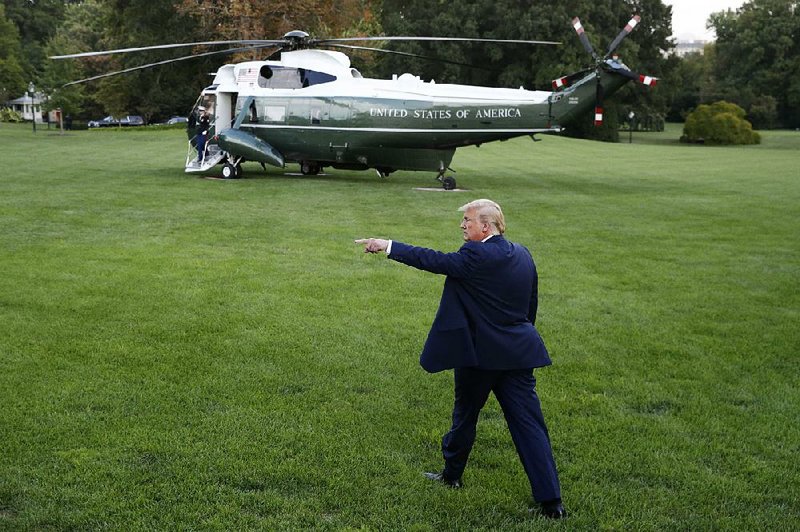 President Donald Trump heads for Marine One on the South Lawn of the White House on Thursday on his way to a rally in Baltimore. Earlier, Trump tweeted that China was expected to again begin buying “large amounts of our agricultural products.”