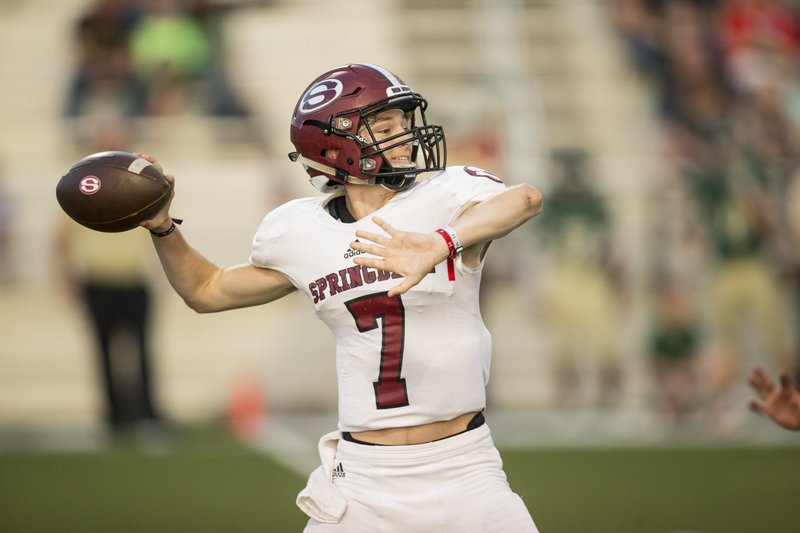 Conner Hutchins, Springdale quarterback, throws the ball in the first quarter vs Alma Friday, Sept. 13, 2019, at Airedale Stadium in Alma.
