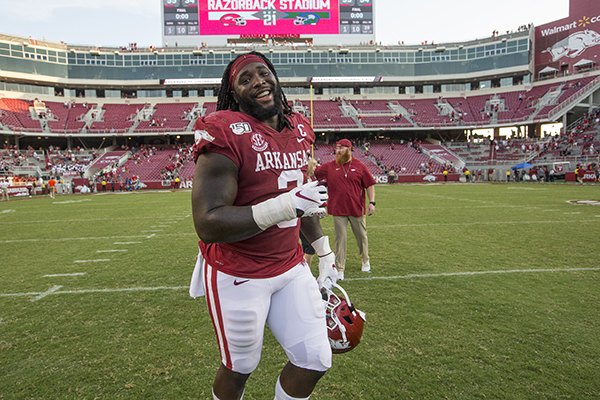 WholeHogSports - Troubled childhood did not define McTelvin Agim