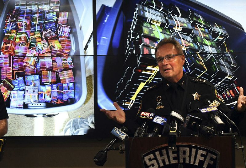 Kenosha County Sheriff David Beth  talks  last week about THC- infused vaping cartridges that were part of a large-scale marijuana operation in the Kenosha, Wis., area. 