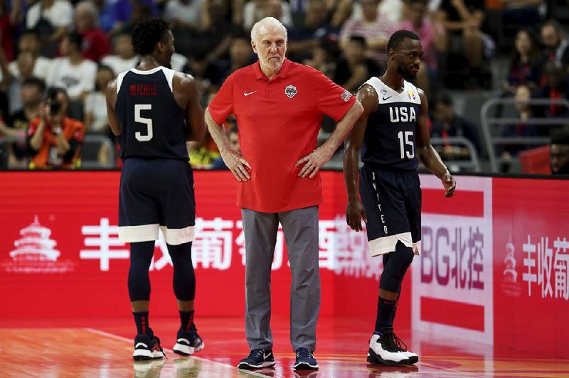 U.S. Coach Gregg Popovich (center) looks on as Donovan Mitchell (left) and Kemba Walker look away during a 94-89 loss to Serbia in a consolation game at the FIBA World Cup. Former Los Angeles Laker Kobe Bryant said the U.S. failing to medal in the World Cup should not come as a surprise. He said the rest of the world is catching up. 