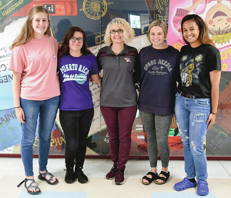 Lake Hamilton Senior High students Colleen Miller, left, Zoie Keys, computer science teacher, Karma Turner, Abby Reynolds, and Kendal Shamel represent the Girls Who Code club at Lake Hamilton. -Photo by Grace Brown