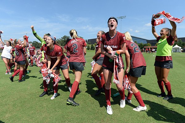 Arkansas players celebrate following a 2-0 victory over No. 1 North Carolina on Sunday, Sept. 15, 2019, in Fayetteville. 