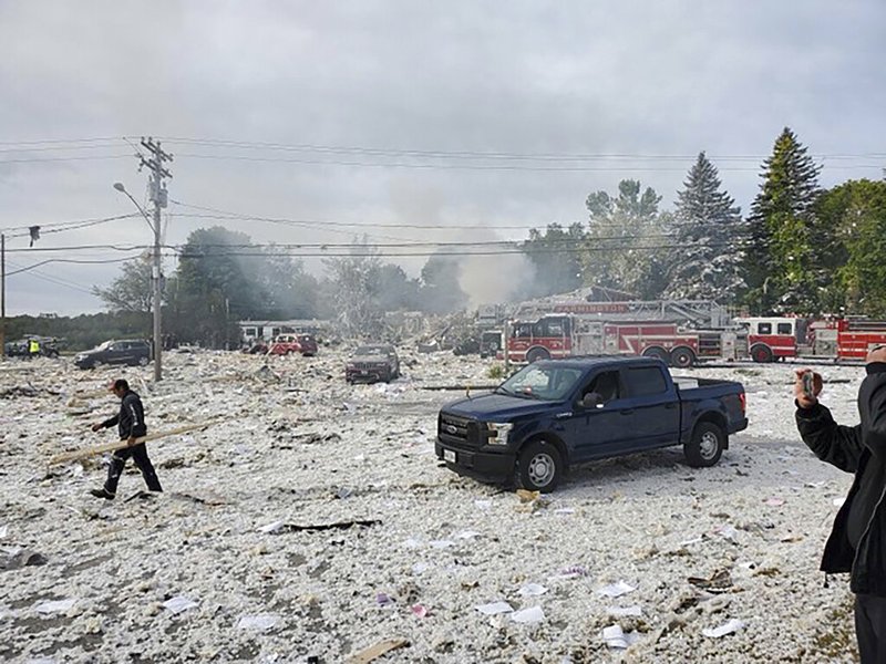 A man works at the scene of a deadly propane explosion, Monday, Sept. 16, 2019, which leveled new construction in Farmington, Maine. (Jacob Gage via AP)